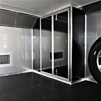 Air compressor cabinet mounted on upper storage deck